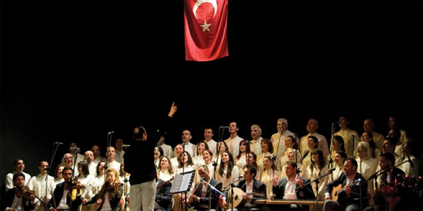 Image from a concert ticket depicting the Civilizations Choir of Antakya on stage.