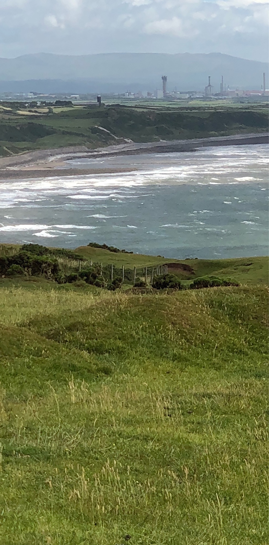 Sellafield site seen from the north across the bay at the village of St Bees, four miles south of Whitehaven, 2018. Photo by Petra Tjitske Kalshoven.