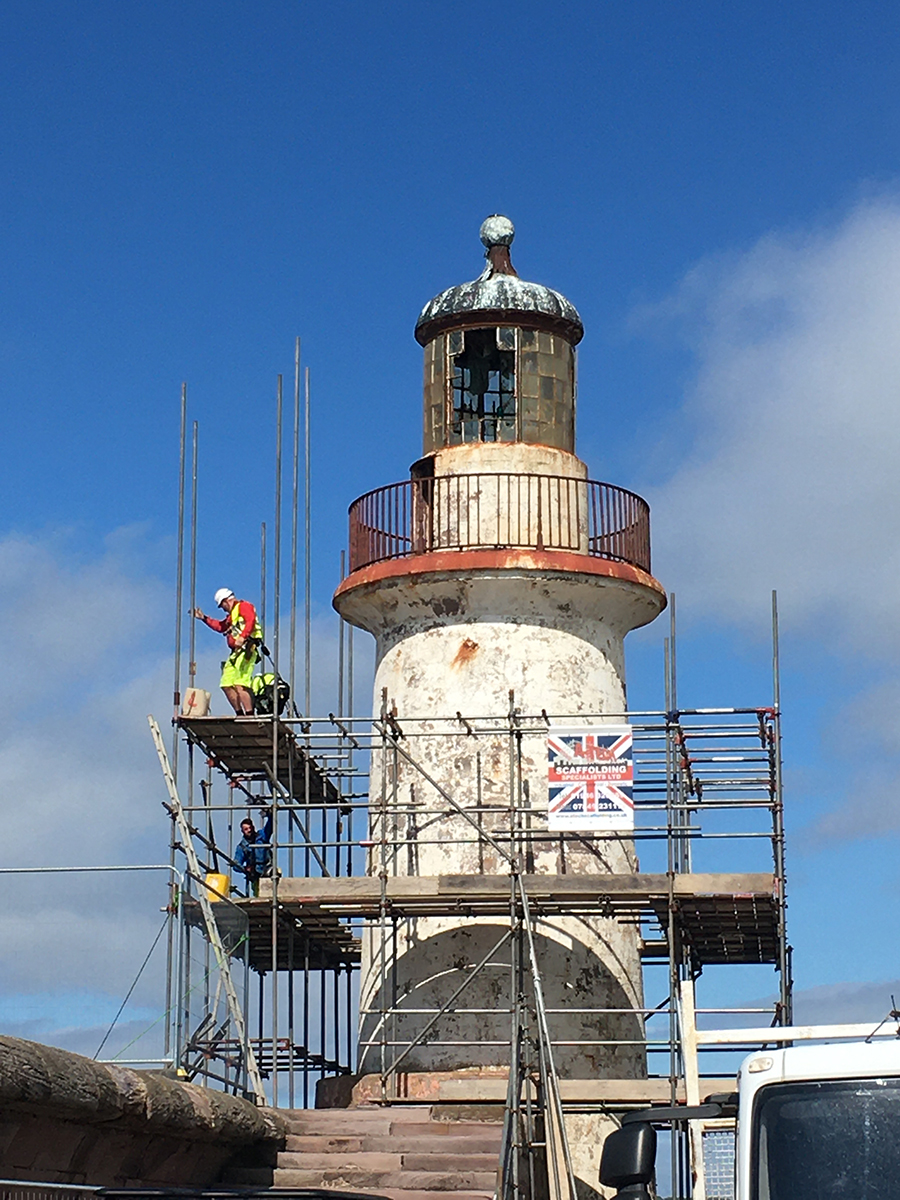 Repairs begin at Whitehaven’s West Pier lighthouse, a Harbour Commissioners project funded primarily through Sellafield Limited’s SiX (Social Impact, Multiplied) program, August 2021. Photo by Petra Tjitske Kalshoven.