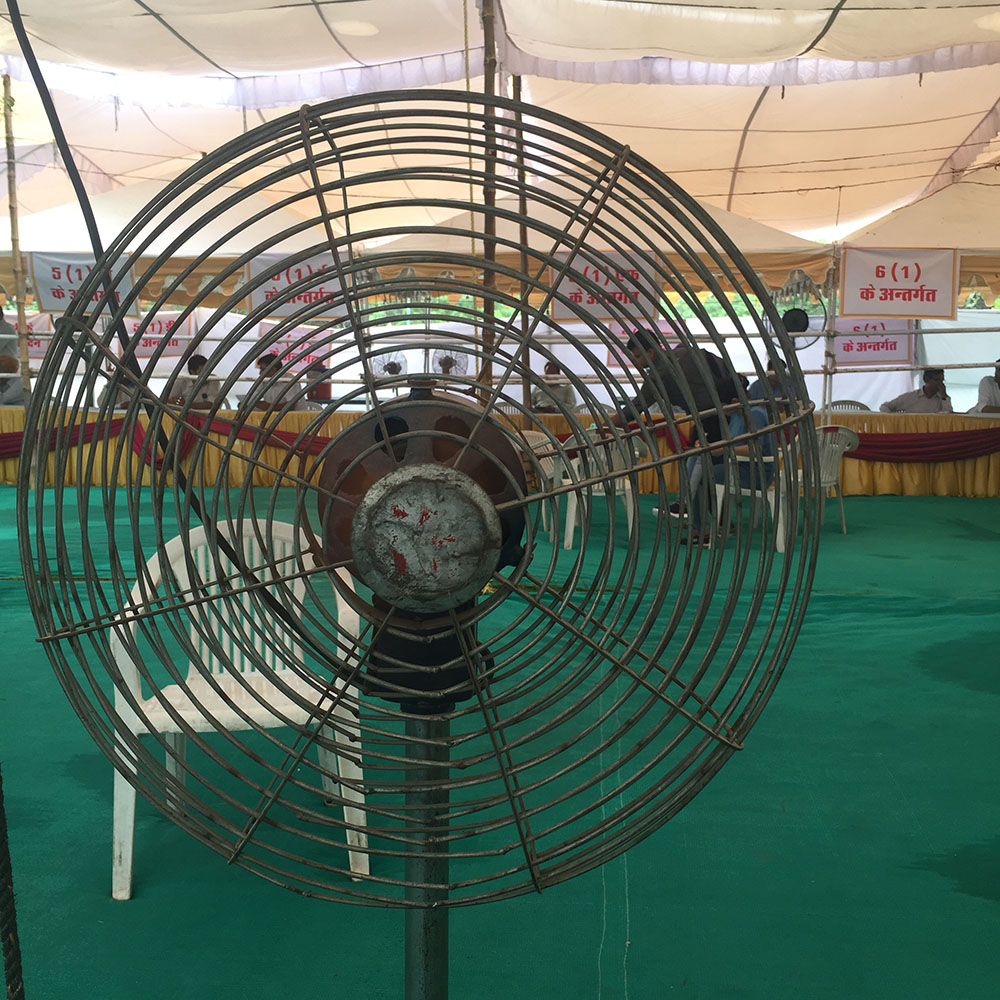 Standing fan at citizenship camp. Photo by Natasha Raheja.