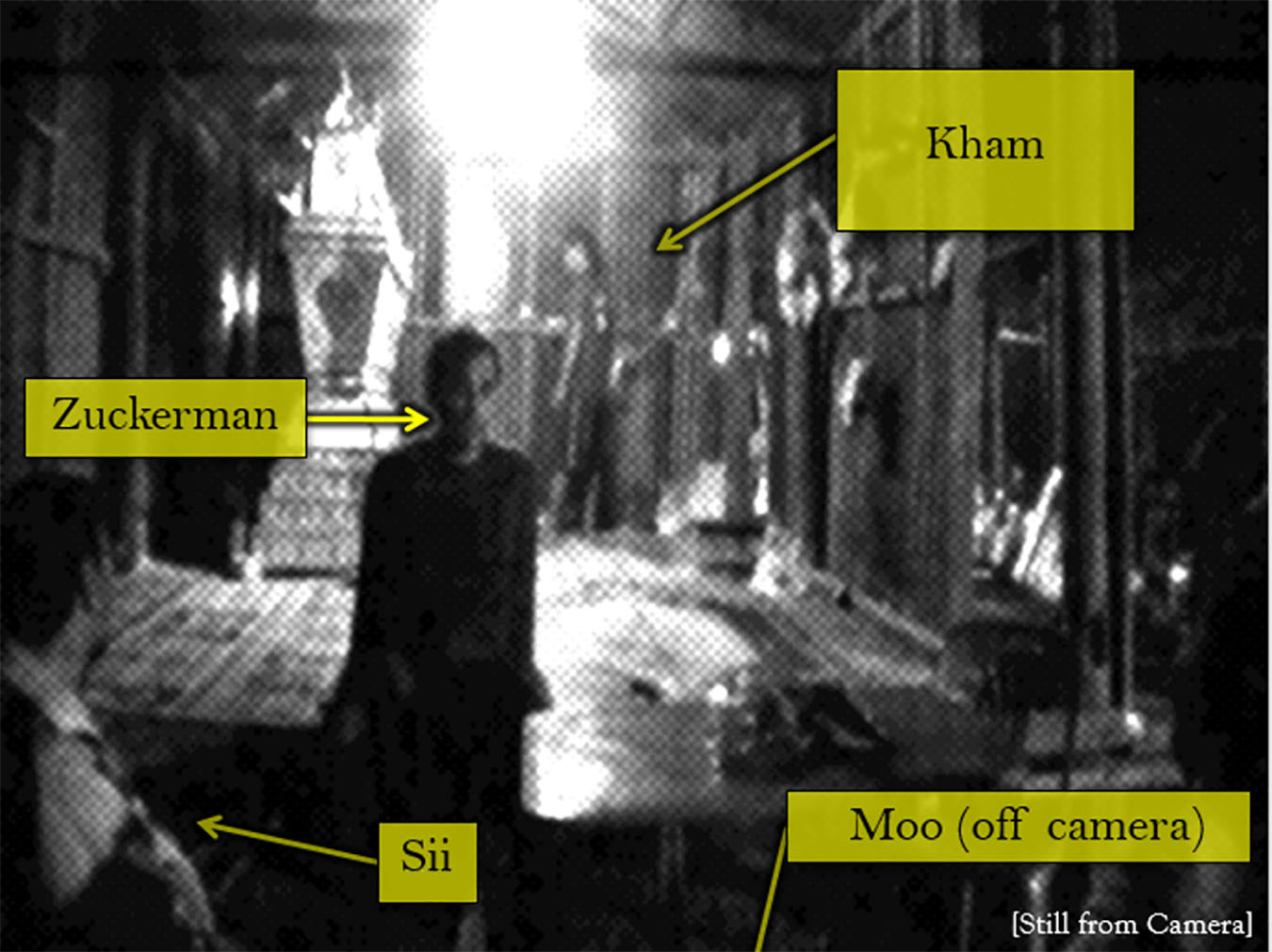 Kham fiddling with the lights. Photo by Charles H. P. Zuckerman.