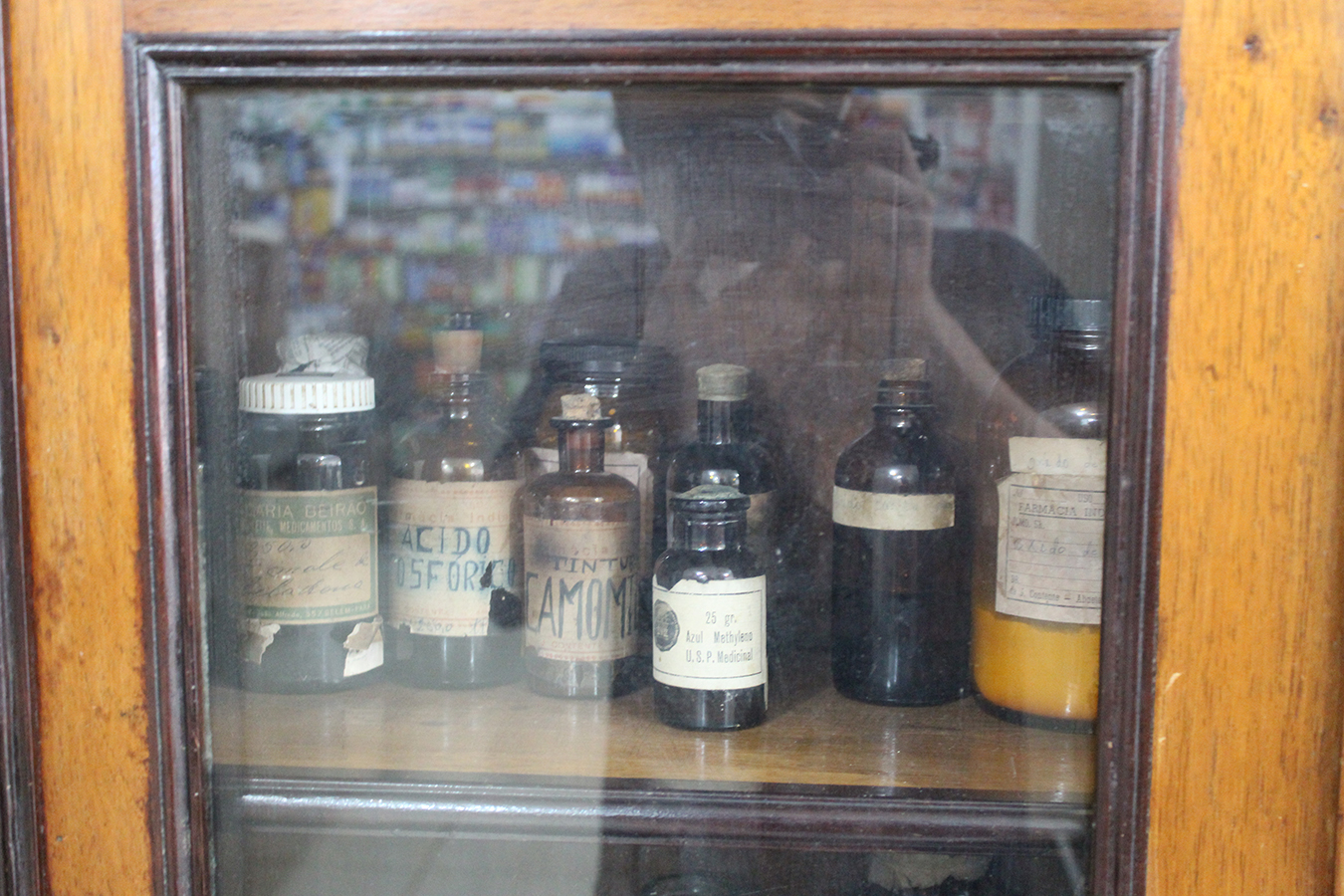 Old medicine cabinet at “Velho Armando’s” riverine pharmacy, founded in 1923. Photo by Matthew Abel, October 2021.