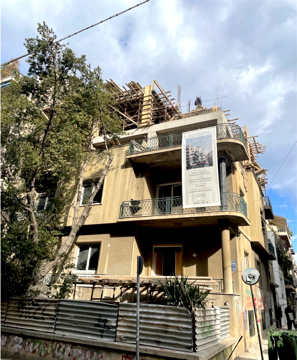 Apartment building under construction and surrounded by scaffolding.